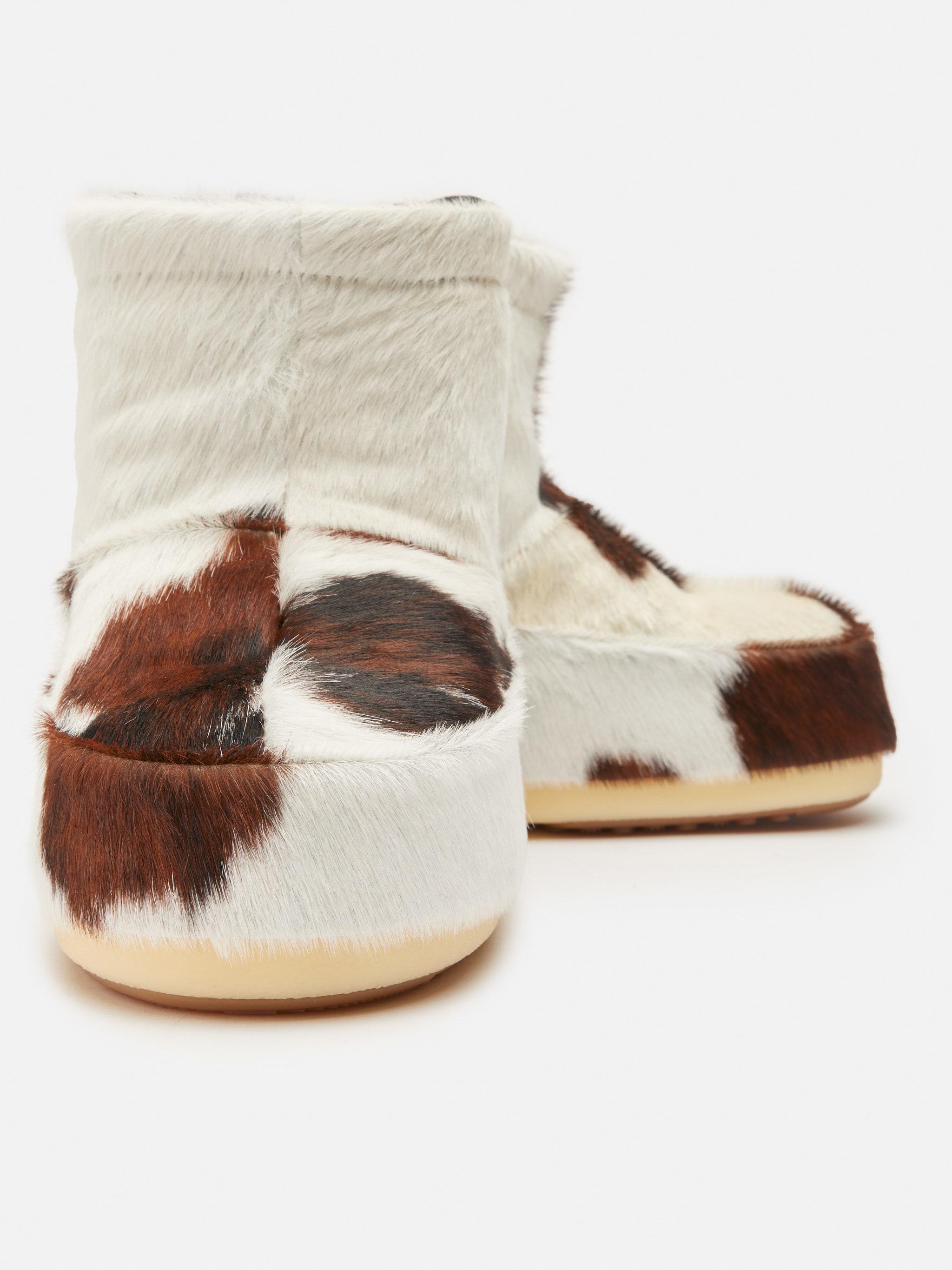 BOTAS CON ESTAMPADO DE VACA ICON LOW SIN CORDONES